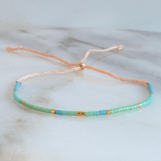 Handmade Adjustable Seed Bead String Bracelet • Aruba Blue